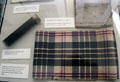 Kaleidoscope, book & tartan scarf from childhood of Robert Louis Stevenson at Writers' Museum. Edinburgh, Scotland.