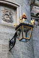 Light with thistles & royal crown at Holyrood Palace. Edinburgh, Scotland.