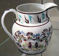 Creamware jug with Patie & Roger of Allan Ramsay's Poem "Gentle Shepherd" illustrated by David Allan by Verreville Pottery & Glass of Finnieston on Clyde at National Museum of Scotland. Edinburgh, Scotland.