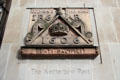 Royal plaque reset in modern Netherbow Port on Royal Mile. Edinburgh, Scotland.