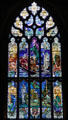 Great window in north transept shows Christ stilling the tempest & walking on the sea stained glass window by Douglas Strachan of Edinburgh at St Giles Cathedral. Edinburgh, Scotland.