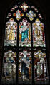 Stained glass window with saints of early Christian Church in Scotland - St Columba, St Andrew, St Cuthbert, St Margaret, St Giles, St David at St Giles Cathedral. Edinburgh, Scotland.