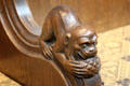 Carved monkey eating fruit in Thistle Chapel at St Giles Cathedral. Edinburgh, Scotland.