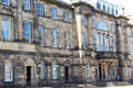 Row houses which combine into neo-classical palace facade on Charlotte Square. Edinburgh, Scotland.
