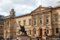General Register House with Duke of Wellington statue on Princes St. Edinburgh, Scotland