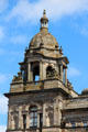 Corner tower of Glasgow City Chambers with sculptures by John Mossman & George Lawson. Glasgow, Scotland.