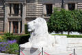 Marble lion sculpture on George Square Cenotaph by Ernest Gillick. Glasgow, Scotland.
