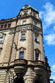 Renaissance-style commercial building with dome & lantern atop octagonal corner. Glasgow, Scotland.