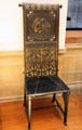 Cast iron & oak chair by Christopher Dresser for Coalbrookdale of Shropshire at Kelvingrove Art Gallery. Glasgow, Scotland.