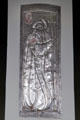 Metal plaque in style of Margaret Macdonald on hall pillar at House for an Art Lover. Glasgow, Scotland.