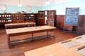 Work tables and cupboards in cookery kitchen at Scotland Street School Museum. Glasgow, Scotland.