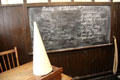 Blackboard with evacuation list in World War II classroom at Scotland Street School Museum. Glasgow, Scotland.