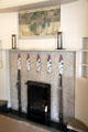 Drawing room fireplace area with candlesticks & gesso panel at Hill House. Helensburgh, Scotland.