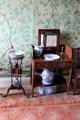 Two washstands with Chinese style pitchers & basins in Kier bedroom at Pollok House. Glasgow, Scotland.