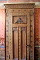 Greek-themed temple-shaped door in dining room at Holmwood. Glasgow, Scotland.