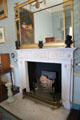 Fireplace with carving of Minerva by Robert Adam in Lady Ailsa's Boudoir at Culzean Castle. Maybole, Scotland.