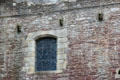 Detail of window & carvings on courtyard wall at Doune Castle. Doune, Scotland.