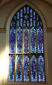 Scottish saints & kings modern stained glass window in Dunfermline New Abbey Church. Dunfermline, Scotland.