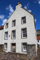 Heritage house with three-story facade with crowsteps roofline. Culross, Scotland.