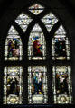 Stained glass window with Mary ringed by biblical episodes at Culross Abbey Church. Culross, Scotland.