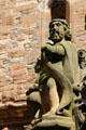 Man with cloak on Linlithgow Palace fountain. Linlithgow, Scotland.