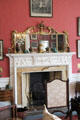 Fireplace with adamesque mantel in sitting room at Lauriston Castle. Edinburgh, Scotland.