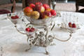Ornate silver & pressed glass fruit bowl centerpiece in dining room at Lauriston Castle. Edinburgh, Scotland.