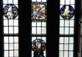 Stained glass insets in hallway windows at Lauriston Castle. Edinburgh, Scotland.