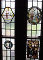 Stained glass insets in hallway windows at Lauriston Castle. Edinburgh, Scotland.