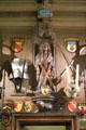 Wood carving of St Andrew & arms in entrance hall at Abbotsford House. Melrose, Scotland.