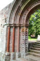 Carved Romanesque east processional doorway arch at Dryburgh Abbey. Scotland.
