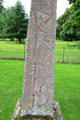 Relief of abbey's founder, Hugh de Moreville, carved on King James obelisk at Dryburgh Abbey. Scotland.