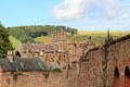 Melrose Abbey ruins rise above Melrose landscape. Melrose, Scotland.