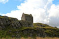Smailholm Tower house on rocky hill. Scotland.