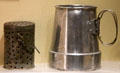 Antarctica expedition tea strainer & aluminum pemmican used on sledging journeys at pole at RRS Discovery Museum. Dundee, Scotland.