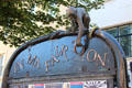 Bronze monkey on "In Ma Fair Toon" sculpture by Angela Hunter on High Street. Dundee, Scotland.
