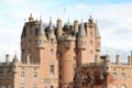 Central towers of Glamis Castle which started as hunting lodge before 1033. Angus, Scotland.
