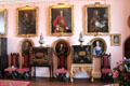 Lyon family paintings & antique chests on walls in great hall at Glamis Castle. Angus, Scotland.