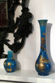 Blue glass vases with Chinese themes in gold in king's bedroom at Glamis Castle. Angus, Scotland.