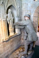 Sculpture shows destruction of statues of saints during Scottish Reformation at St Andrews Castle. St Andrews, Scotland.