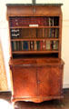 Bookshelf cabinet by Robert Lorimer in drawing room at Kellie Castle. Pittenweem, Scotland.