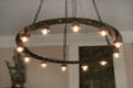 Modern iron circular chandelier designed by Hew Lorimer at Kellie Castle. Pittenweem, Scotland.