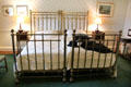 Guest bedroom with brass bed at Hill of Tarvit Mansion. Cupar, Scotland.