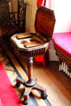 Antique sewing stand in long gallery at Scone Palace. Perth, Scotland