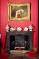 Fireplace with painting & china in Queen Victoria suite at Scone Palace. Perth, Scotland.