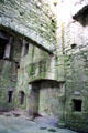 Fireplace & salt storage niche to right in Great hall of tower house at Cardoness Castle. Scotland