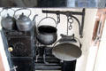 Kitchen fireplace including Scottish bannock bread girdle at Robert Burns House. Dumfries, Scotland.