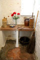 Kitchen counter with crocks & implements at Robert Burns House. Dumfries, Scotland.