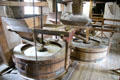 Grinding wheels at New Abbey Corn Mill. New Abbey, Scotland.