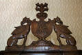 Carved mythical animals atop cupboard in Laird's bedroom at Crathes Castle. Crathes, Scotland.